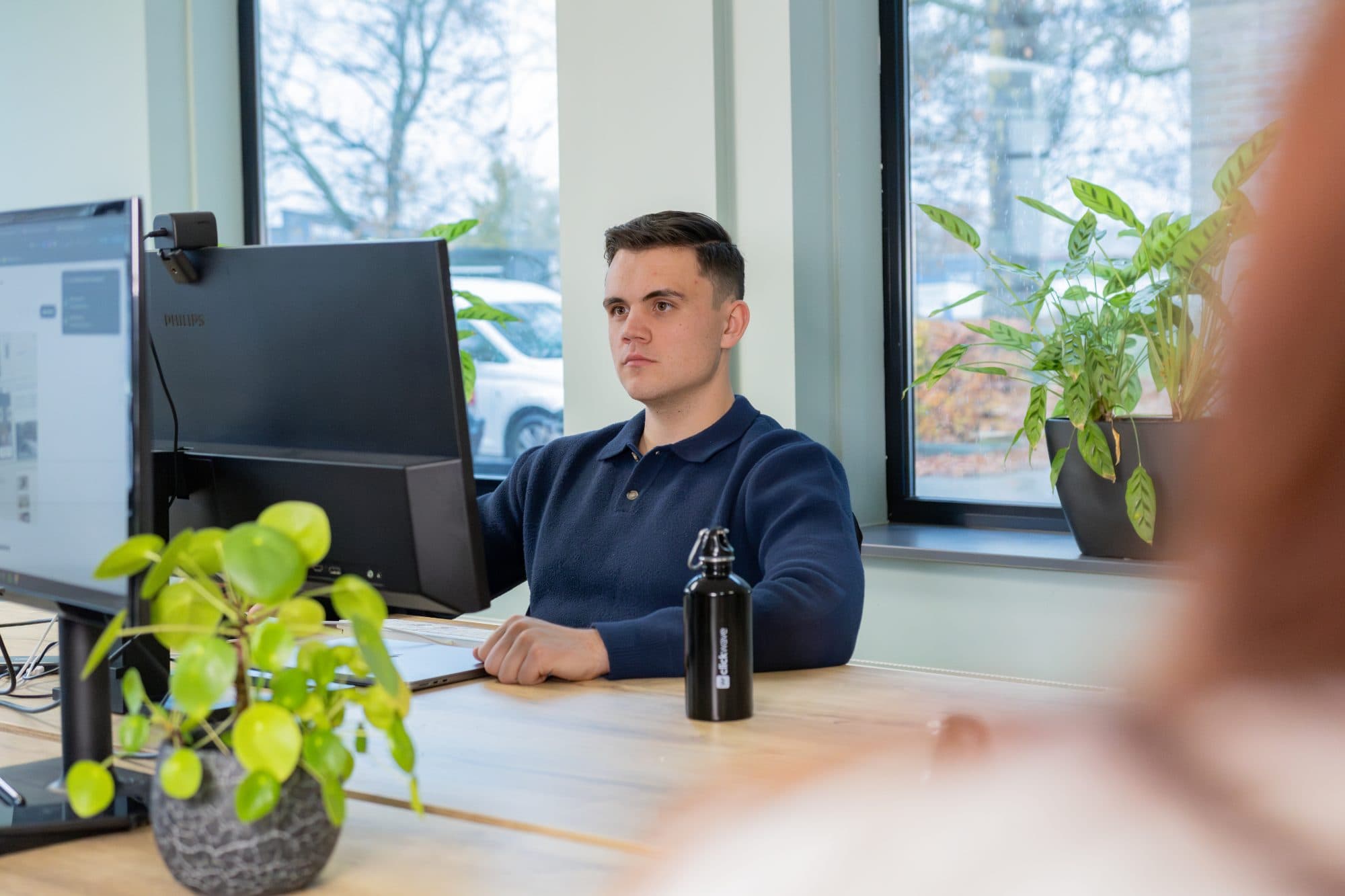 Joël van Clickwave aan het werk voor een klant